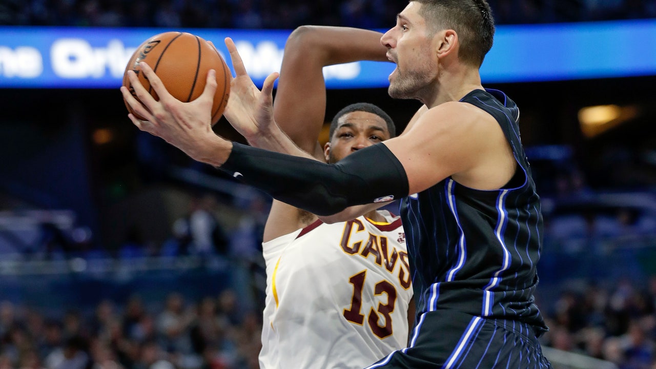 Magic, Vucevic beat Cavaliers in season opener